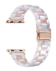 Blush pink and white tortoise shell patterned Apple Watch® band closure view