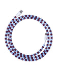 Burgundy and light blue USB-C beaded charging cable coiled on lavender background