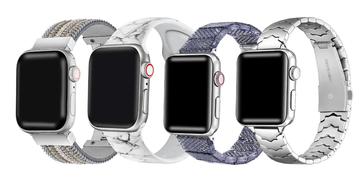 A collection of four Apple Watch bands in different colors and patterns.