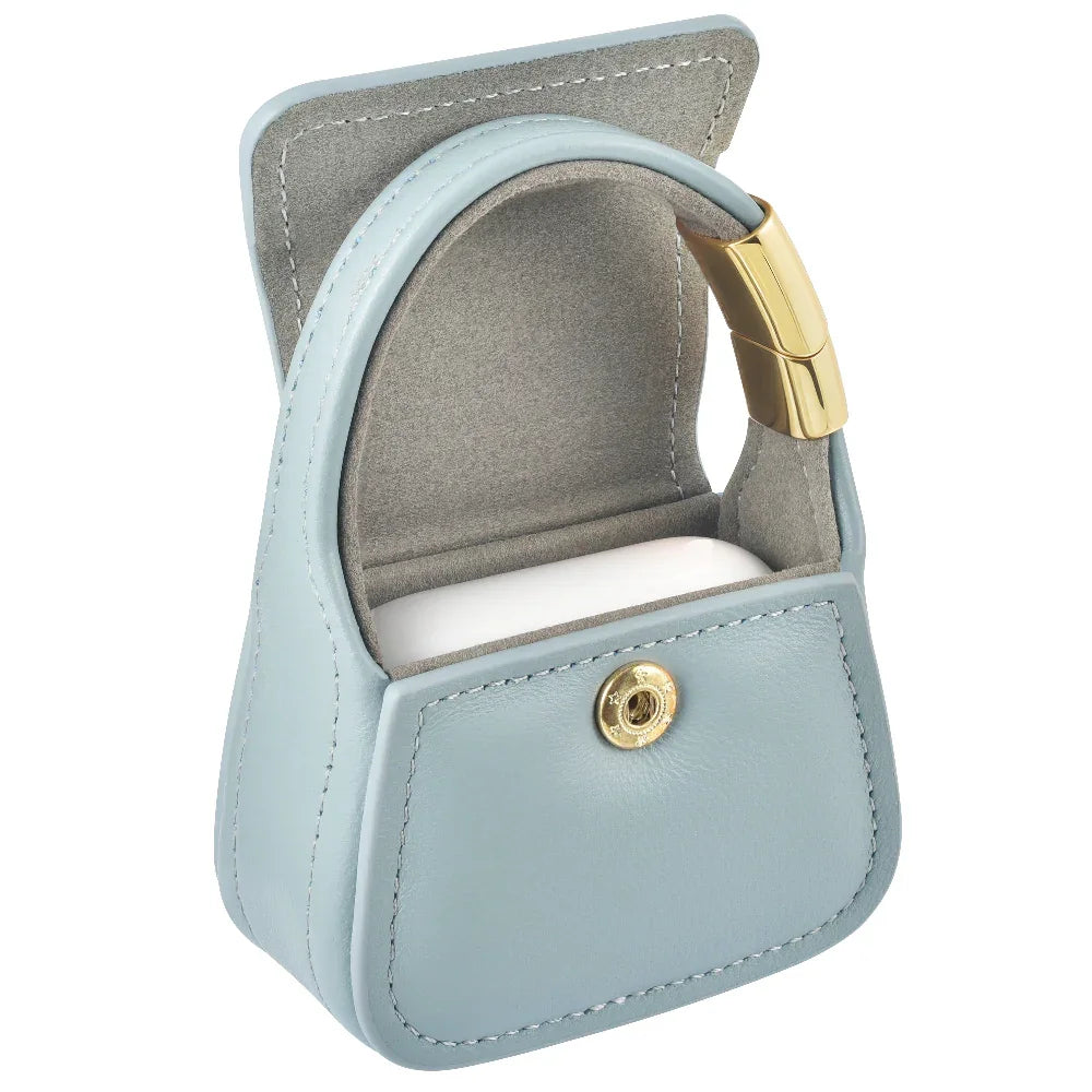 Blue leather mini purse charm open showing interior and snap closure