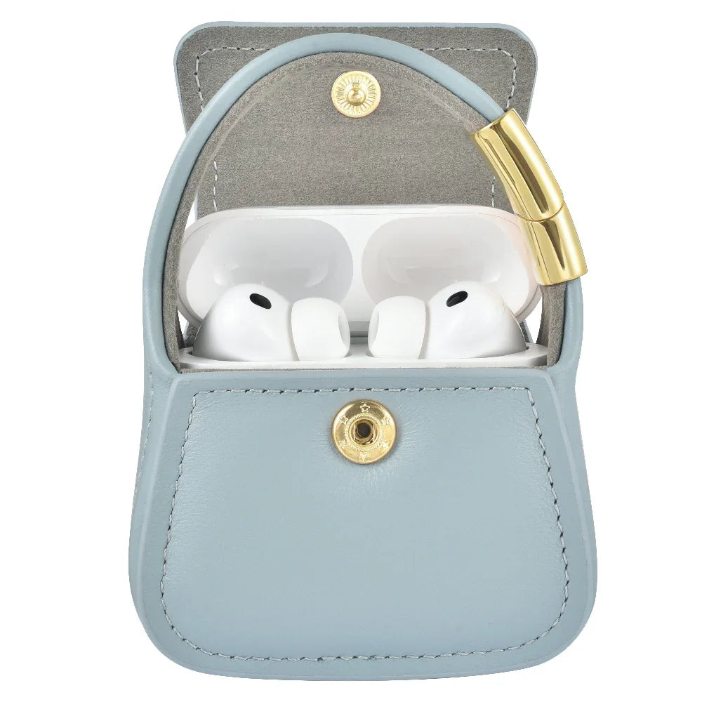 Blue leather mini purse charm open with AirPods Pro inside