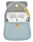 Blue leather mini purse charm open with AirPods Pro inside