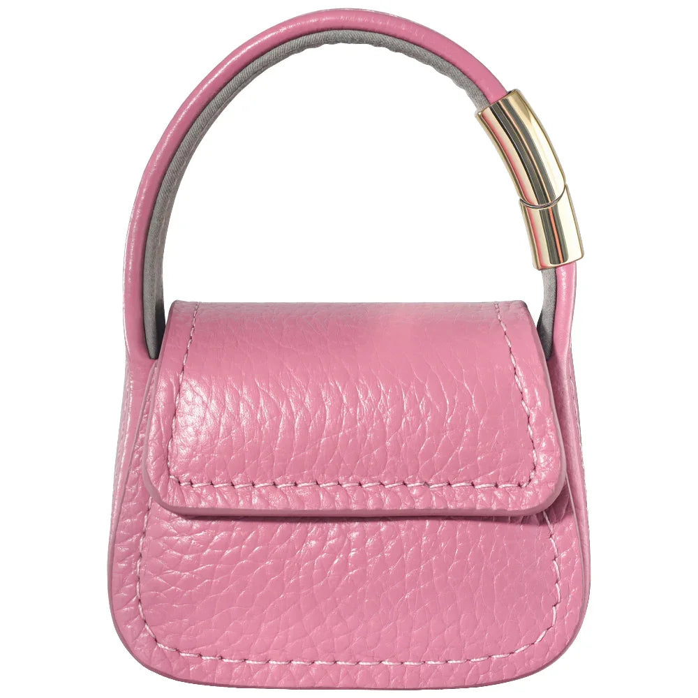 Pink leather mini purse charm closed with textured leather finish detail