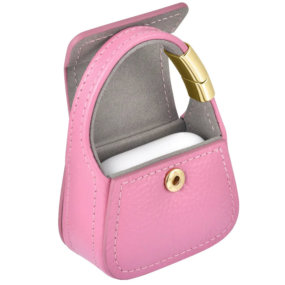 Pink leather mini purse charm open showing interior and snap closure