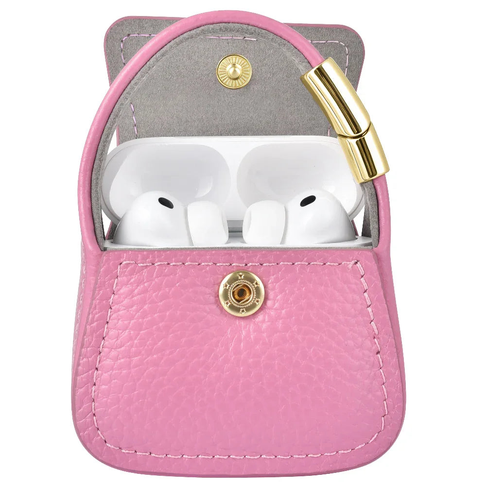 Pink leather mini purse charm open with AirPods Pro inside