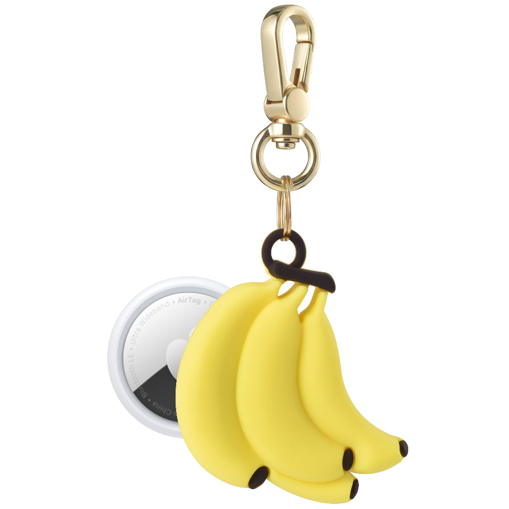 Posh Tech yellow Banana silicone AirTag bag charm shown with AirTag inserted, banana-bunch design