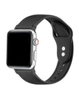 Black silicone Apple Watch® band fastened on the watch case, front view