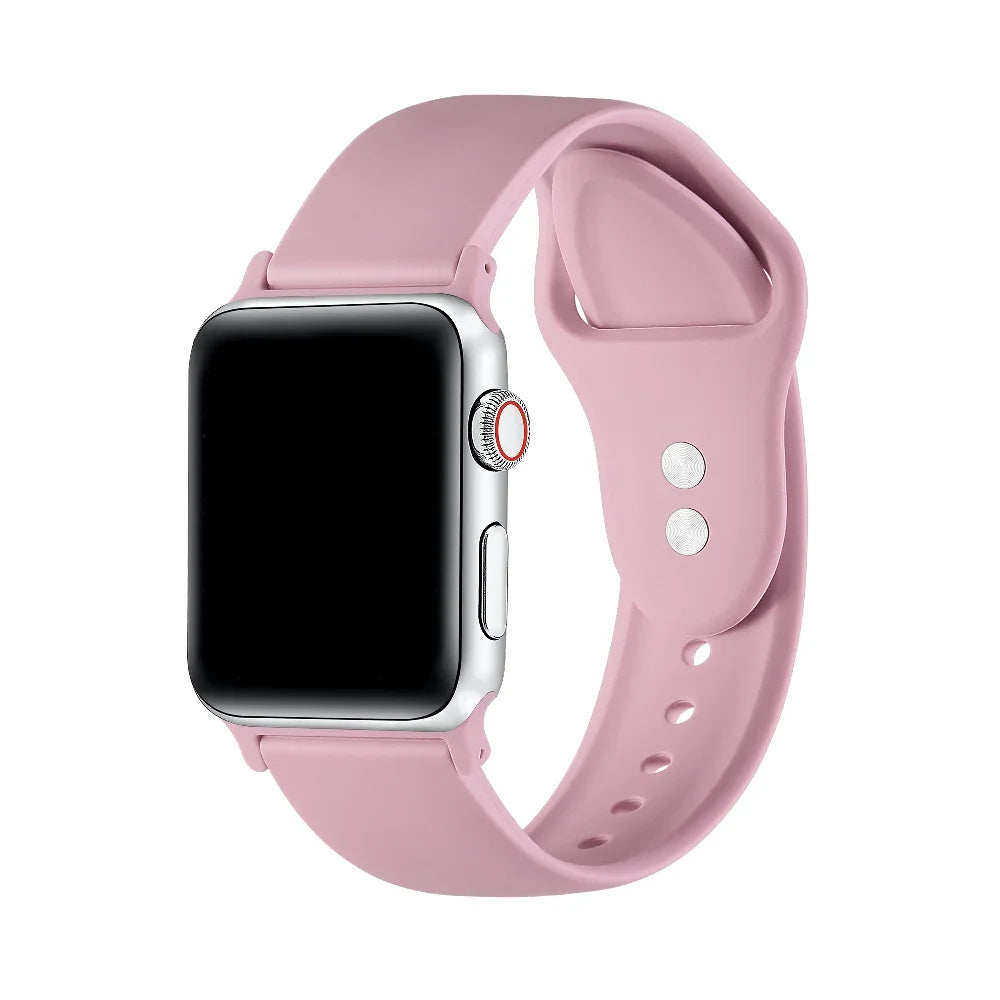 Cosmetic Pink silicone Apple Watch® band fastened on the watch case, front view