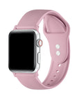 Cosmetic Pink silicone Apple Watch® band fastened on the watch case, front view