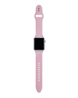 Cosmetic Pink silicone Apple Watch® band close-up, detail view of molded texture and pin closure holes