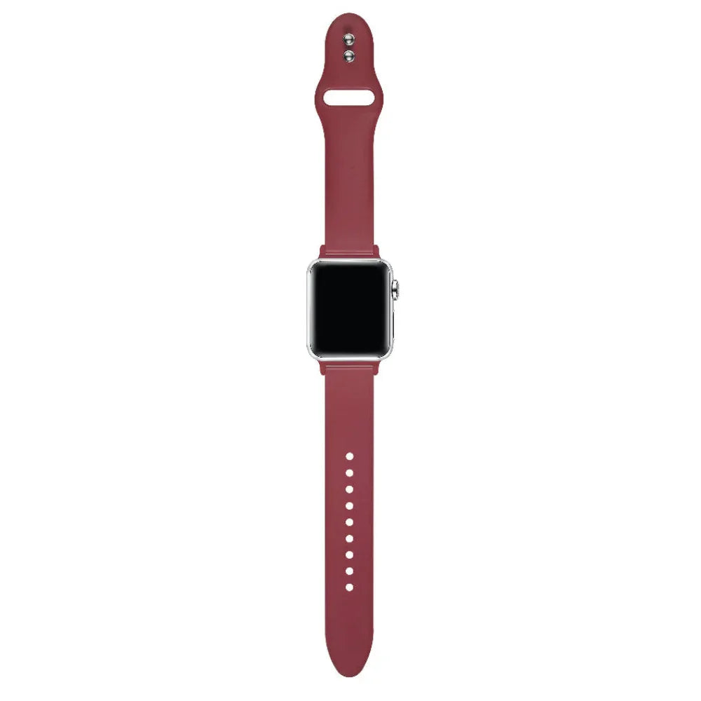 Cranberry Juice silicone Apple Watch® band close-up, detail view of molded texture and pin closure holes