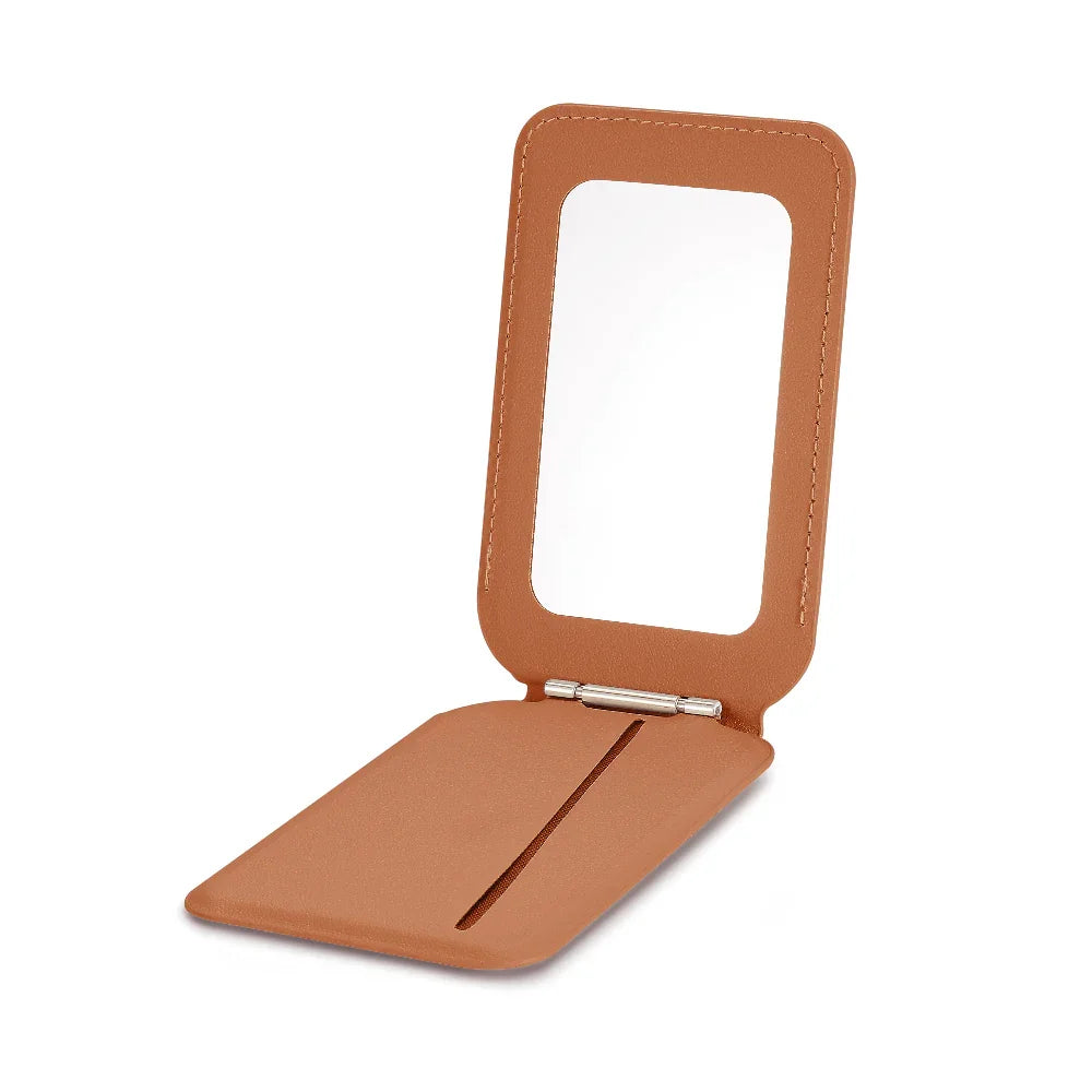 Brown MagSafe magnetic wallet open showing compact mirror inside